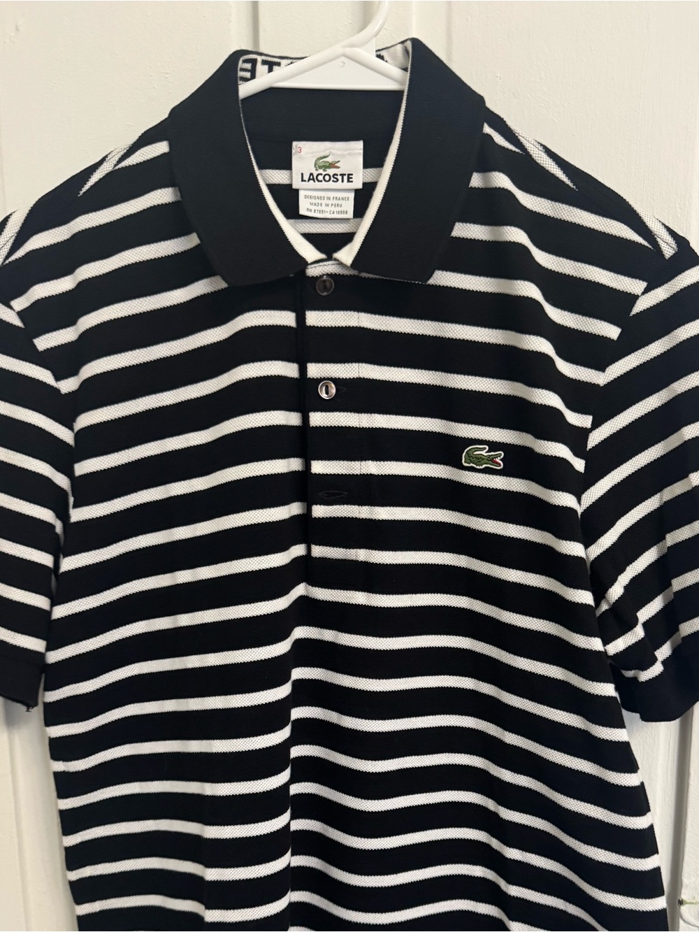 Lacoste black and white polo size 3 - small
